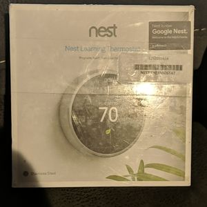 New in plastic wrap Google Nest Thermostat